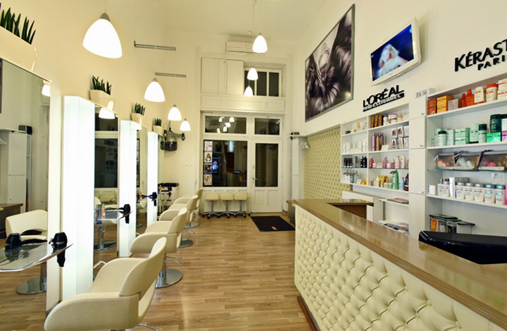 Glamorous-Hair-Salon-Interior-Design-Ideas-with-Tufted-Reception-Desk-and-Superb-Pendant-Lamps